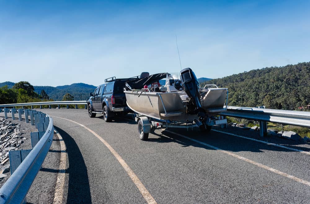 Is It Legal To Pull A Boat Behind A Travel Trailer