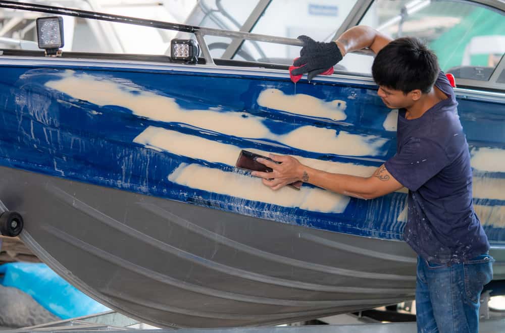 Repairing holes in an aluminum boat using epoxy